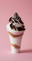 Swirls of Chocolate and Vanilla Soft Serve Ice Cream in a Cup photo
