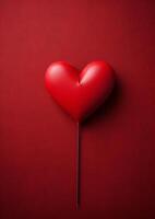 Red heart balloon on a vibrant background photo