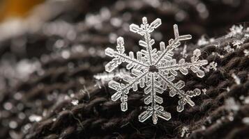 Detailed macro shot of a unique snowflake on a textured surface photo