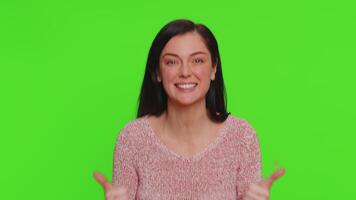 Cheerful young woman greatly approves your suggestion, shaking head approvely like proposal, yes video