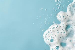 Refreshing blue water splash with bubbles on a clean background photo