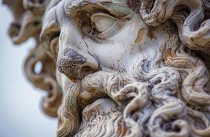 Close up of an Ancient Sculpted Face with Intricate Details photo