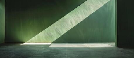 Abstract light and shadow play on green wall photo