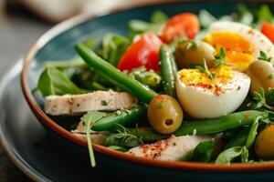 Fresh salad with boiled eggs, tomatoes, and green beans on a plate photo