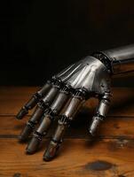 Medieval knights gauntlet on wooden table photo