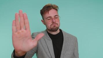 Business man say no hold palm crossed hands in stop gesture, warning of finish, prohibited access video