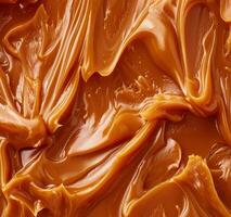 Smooth caramel texture background photo