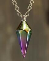 Close up of a colorful crystal pendant on a silver chain photo