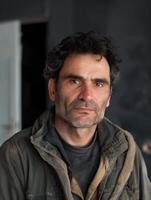 Portrait of a middle aged man with a thoughtful expression photo