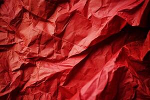 Close up of crumpled red paper texture photo