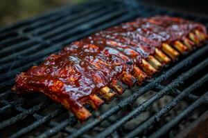Juicy barbecued ribs on a grill photo
