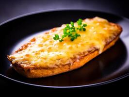 Delicious melted cheese on toast garnished with fresh herbs photo