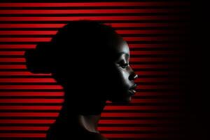 Silhouette of a woman against a striped background photo