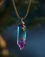 Elegant crystal pendant on a gold chain with a blurred background photo