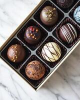Assorted Gourmet Chocolates in Elegant Packaging photo