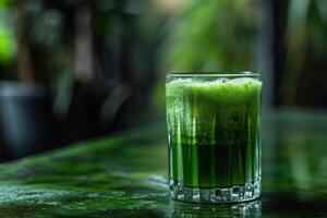 Fresh green juice on a natural background photo