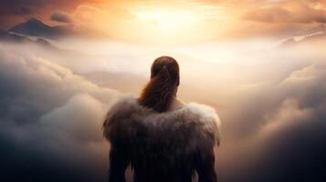 a man standing in the clouds photo