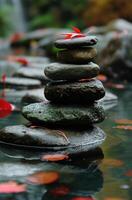 a stack of rocks in water photo