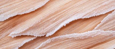 Closeup of a wooden surface with frost patterns photo