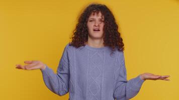 Confused woman feeling embarrassed about ambiguous question having doubts no idea clueless uncertain video