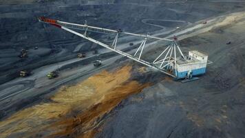 An Aerial View Showcasing Heavy Machinery Utilized in Mining Operations and Activities. Stock Clip video