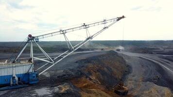 The use of heavy machinery is critical in the operations of open pit mining activities. Stock Clip video