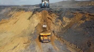 Heavy Machinery Operating Efficiently in the Complex Mining Site Environment and Terrain. Stock Clip video
