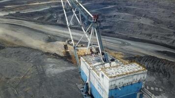 An Aerial View Showing Heavy Machinery Working at a Mining Site in a Landscape Setting. Stock Clip video