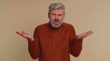 Confused man feeling embarrassed about ambiguous question having doubts no idea clueless uncertain video