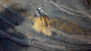 An Aerial View Showcasing Heavy Machinery Working in a Mining Operation from Above. Stock Clip video