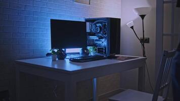 Man is working at professional computer with backlight. Clip. Man is working at computer with backlight. Programmer or gamer with stylish computer setup video
