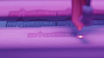 Close-up of laser printer engraving patterns. Media. Dot laser engraves patterns in robotic printer. Laser printers for fine engraving on any material video