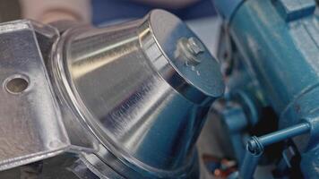 Close up of spinning mechanism of a professional sewing machine. Media. Industrial background of textile factory. video