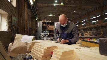 Craftsman Dedicatedly Working in a Wood Workshop, Showcasing Their Expertise in Craftsmanship. Stock Clip video