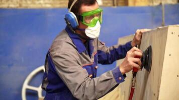 A skilled professional craftsman expertly utilizing various power tools for woodworking tasks. Stock Clip video