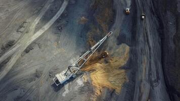 A Breathtaking Aerial View Creatively Showcasing Heavy Machinery Engaged in a Mining Operation. Stock Clip video