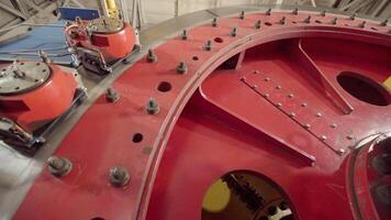 The image shows a closeup of a high precision engineering component with intricate details. Stock Clip video