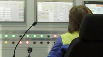 The role of a Control Room Operator within an Industrial Setting is crucial for operations. Stock Clip video