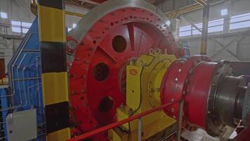 Huge rotary mechanism in industrial production. Stock clip. Mine lifting machine in modern factory. Modern mechanisms for mining video