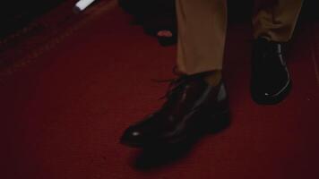 Close up of legs on red carpet. Stock footage. Concept of the official event. video