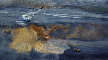 A stunning aerial view showcasing mining equipment actively engaged in various operations. Stock Clip video