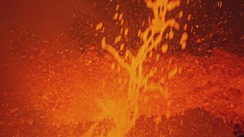 Stream of molten metal pours into factory. Stock footage. Liquid molten metal is poured with splashes at factory. Metallurgical plant with molten metal streams filling space video
