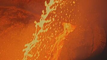 Splashes of molten metal at factory. Stock footage. Bright splashes of molten metal move in streams. Metallurgical plant with splashes and streams of molten metal video