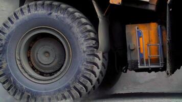 A Heavy Duty Truck Tire in Action Performing on a Construction Site with Multiple Activities. Stock Clip video