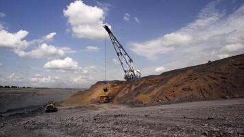 Heavy Machinery Used in OpenPit Mining Operations for Extracting Valuable Minerals and Resources. Stock Clip video