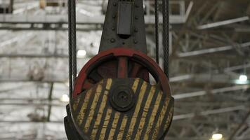 Observe the Industrial Crane Pulley System skillfully operating in action onsite. Stock Clip video