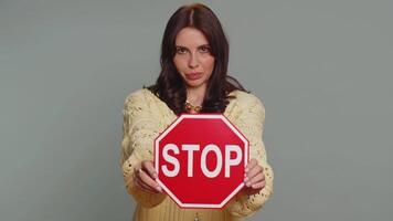 Woman say no hold inscription text red No stop danger sign, warning of finish, prohibited access video