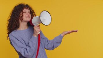 Woman talking with megaphone, proclaiming news, loudly announcing advertisement pointing empty place video