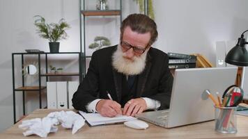 Angry furious man working at home office throwing crumpled paper, having nervous breakdown at work video