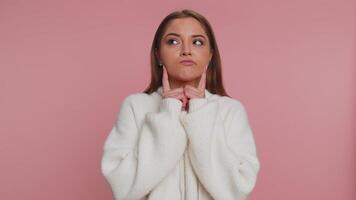 Confused woman feeling embarrassed about ambiguous question having doubts no idea clueless uncertain video